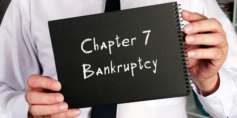 chapter 7 bankruptcy written on notebook